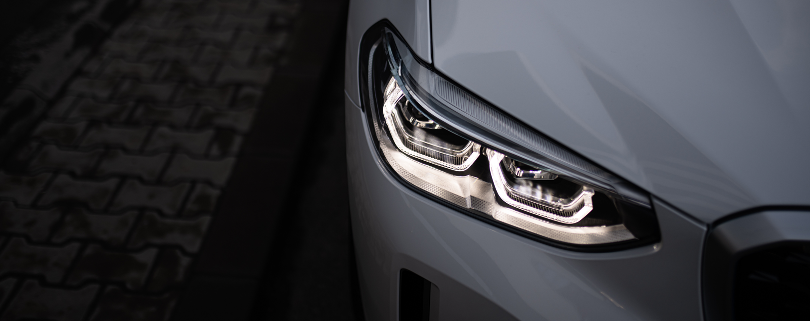 Close up of a white BMW car