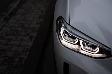 Close up of a white BMW car