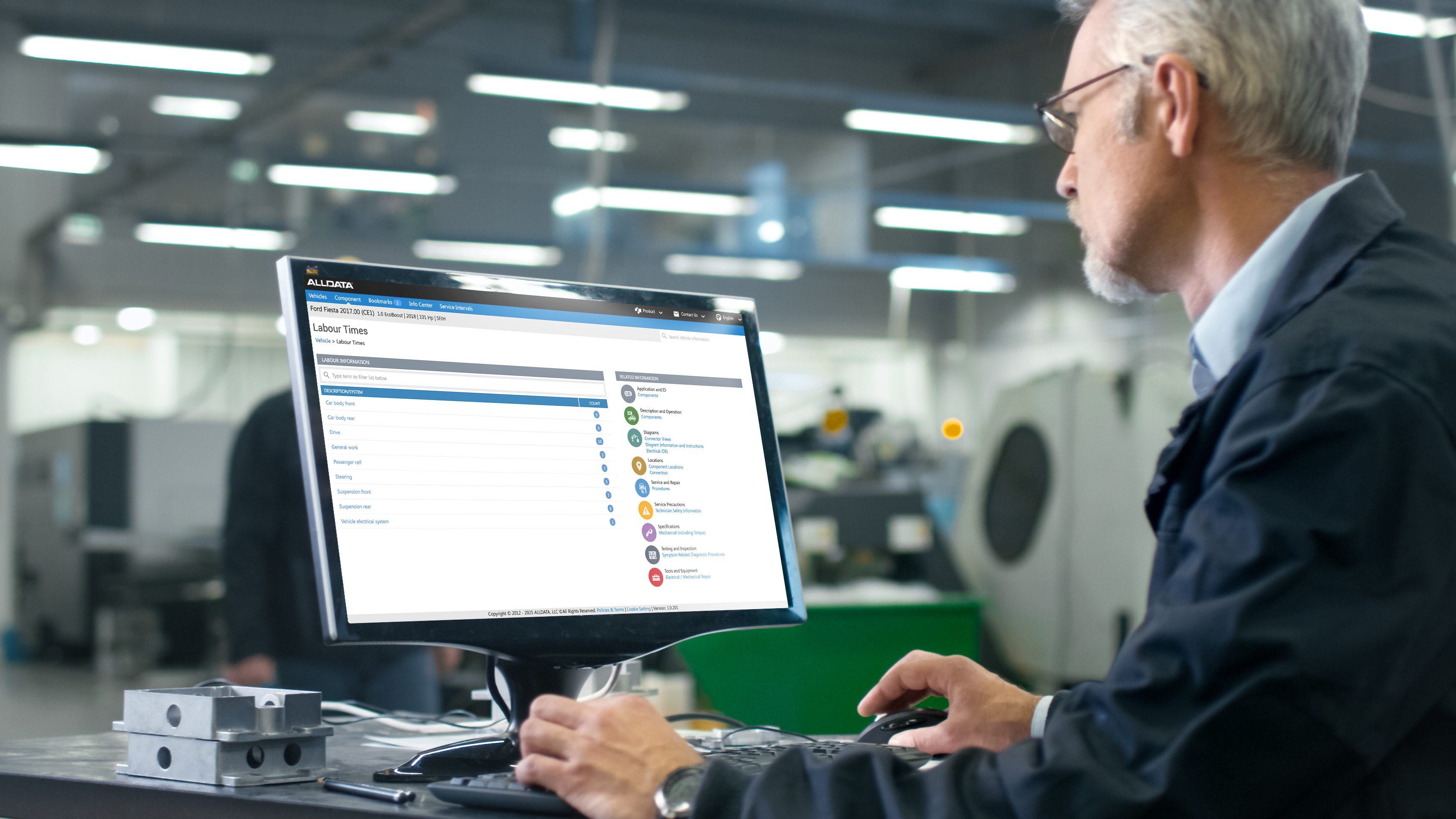 Man looking at Labour times on screen 