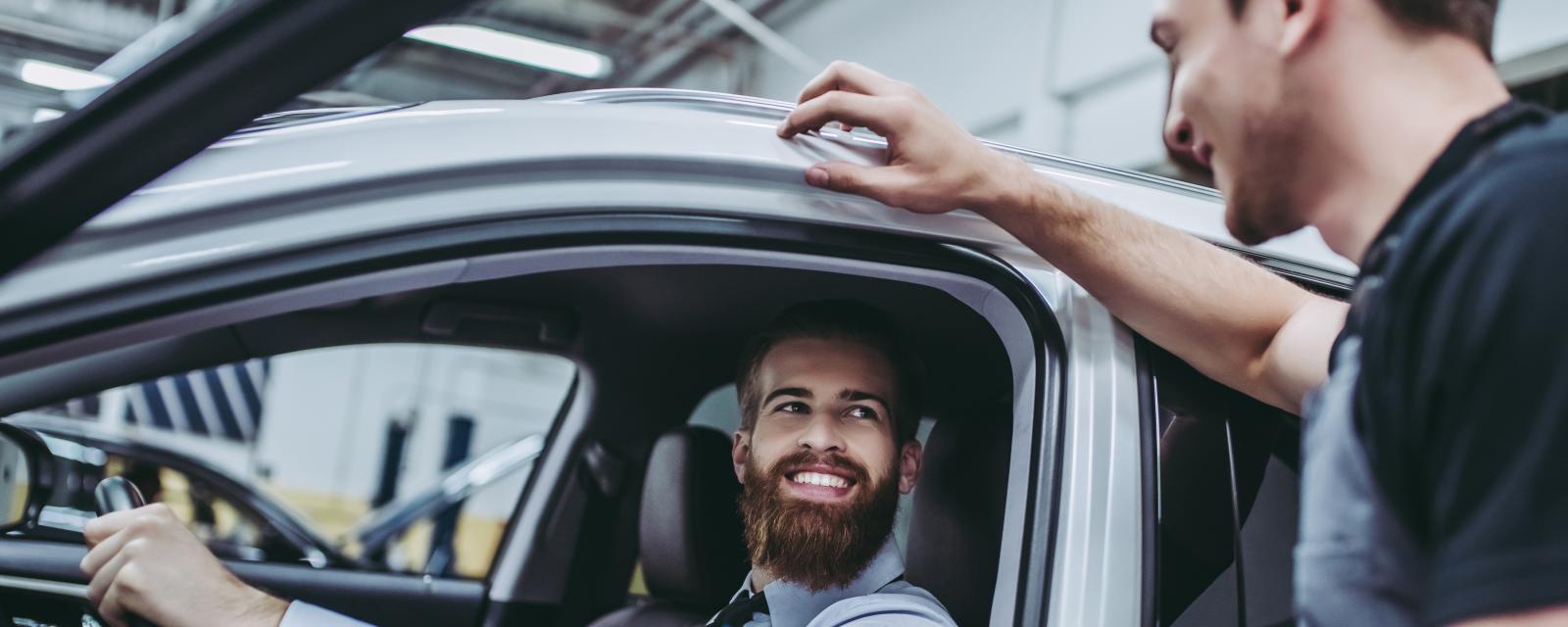 Mechanic Talking to Customer