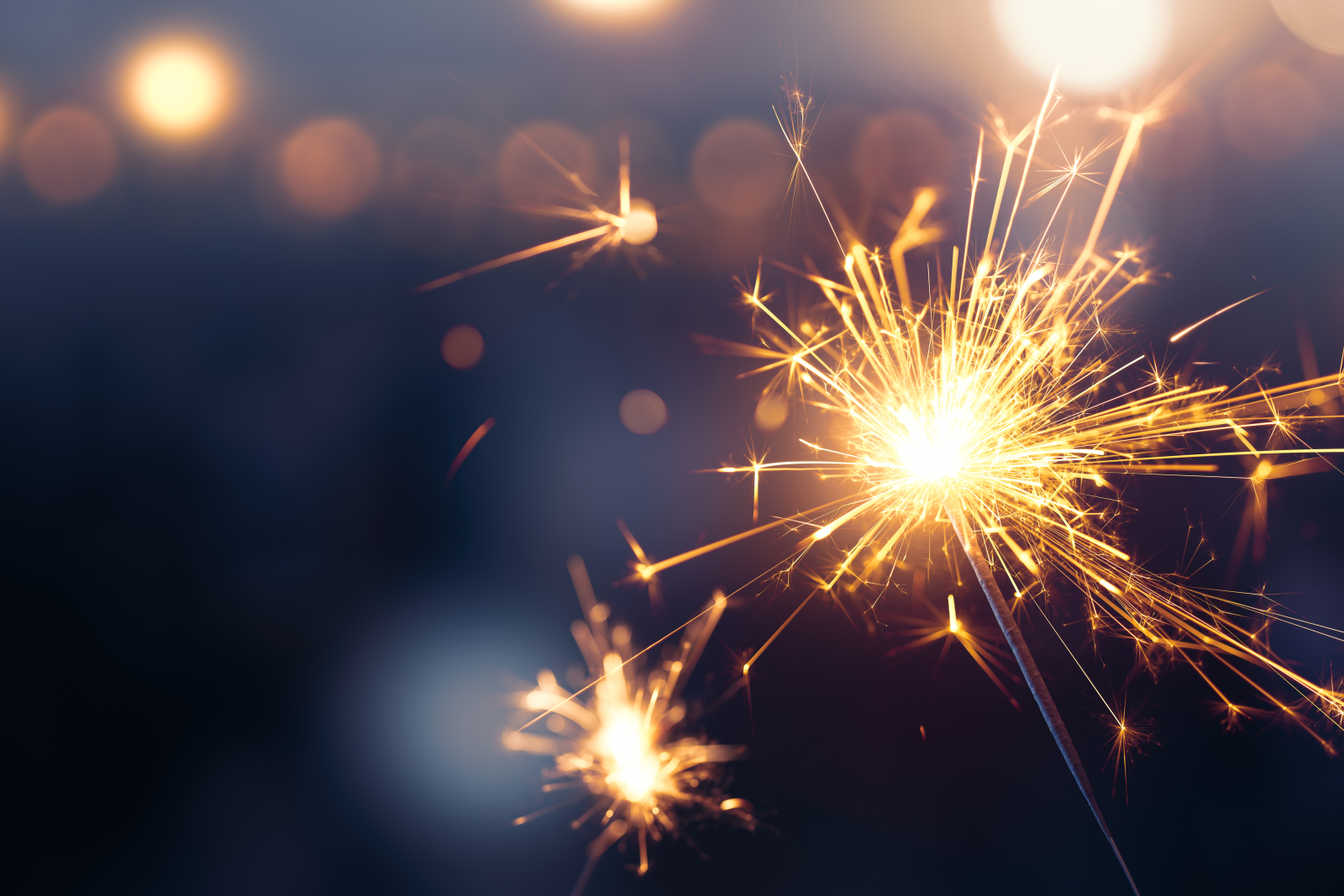 sparkler against dark background