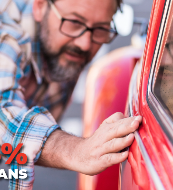 close man looking at his car