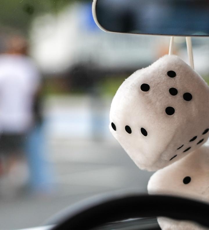 fuzzy dice hanging on review mirror