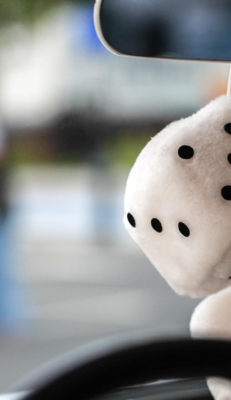 fuzzy dice hanging on review mirror